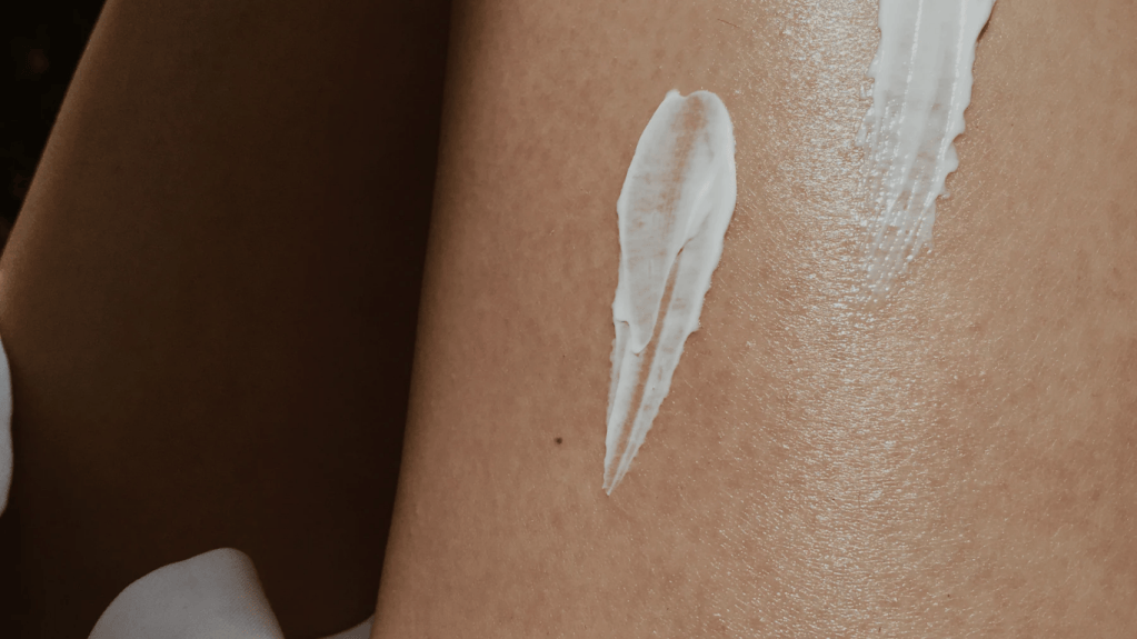 Strokes of moisturizing cream on the skin